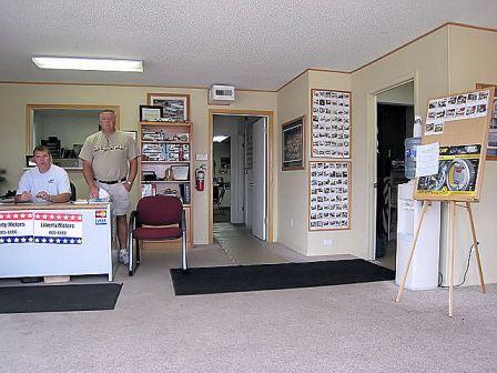 Photo of Spence and Ken in the customer area Liberty Motors, North Liberty Iowa