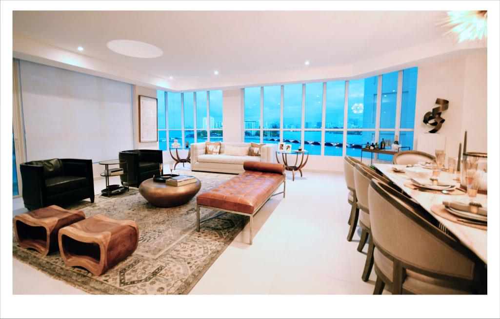 This is a real estate picture of an ocean-front condo in San Juan Puerto Rico - Clubhouse Real Estate Slide 01