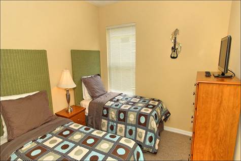 Twin Bedroom with Flat Screen Tv
