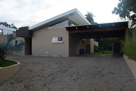 Front of house and car port