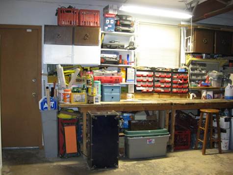 Service Door to Yard &  Workbench in Garage