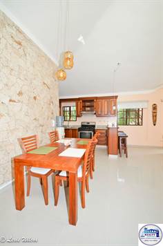 Dining area with coral wall