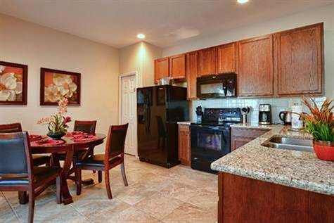 fully equipped kitchen with granite