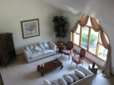 VIEW OF LIVING ROOM FROM LOFT