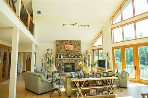 Living room with field stone fireplace