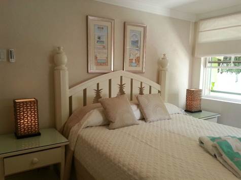 Barbados Luxury, side-shot of bedroom with queen-sized bed 