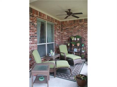 Enjoy and relax on the covered front porch.