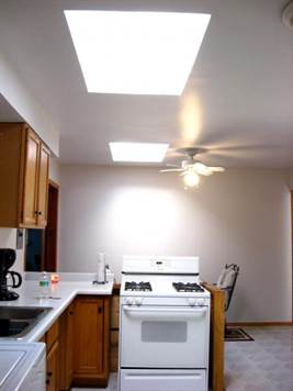2 SKYLIGHTS AND CEILING FAN