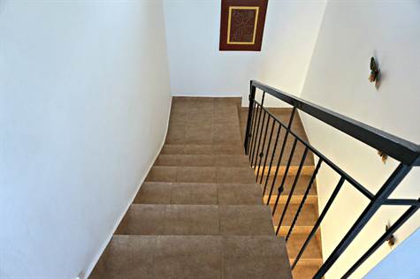 Stairs that lead to Master Bedroom