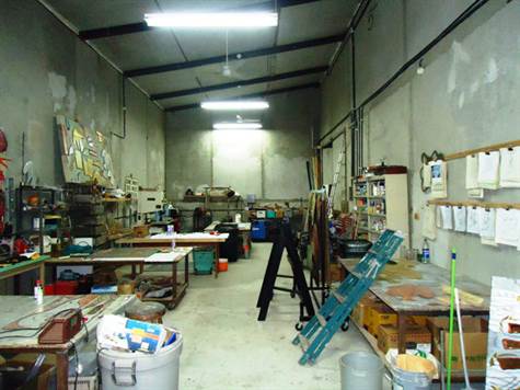 Garage + vast area for workshops, storage, garage, etc. with its own elevator!