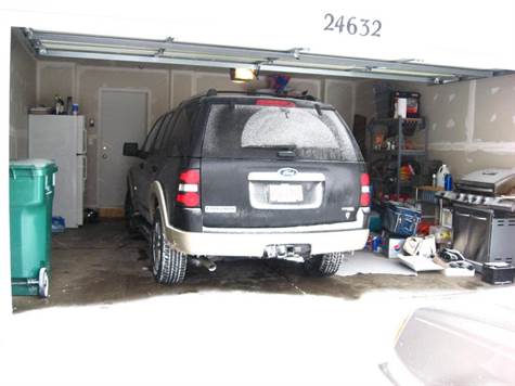 Attached 2 1/2 Car Garage with Automatic Door Opener and 2 Transmitters