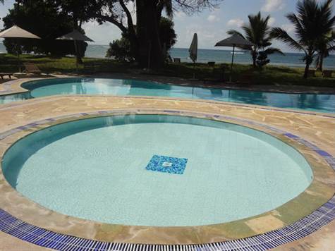 Swimming pool of cottages in Diani Beach Kenya