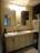 Large master bath with his & hers vanities